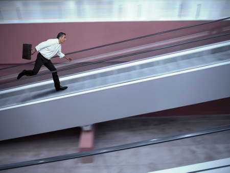 Concept of stressed businessman in airportの写真素材