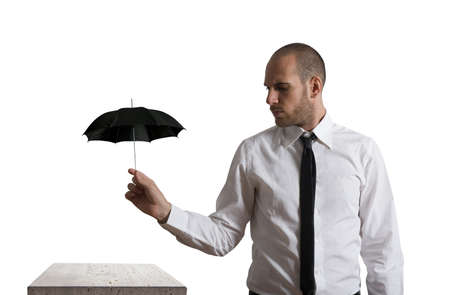 Concept of business protection with umbrellaの写真素材