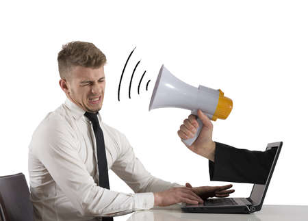 Web advertising and spam concept with businessman and megaphoneの写真素材