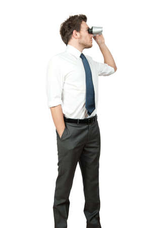 Businessman looking for business on white backgroundの写真素材