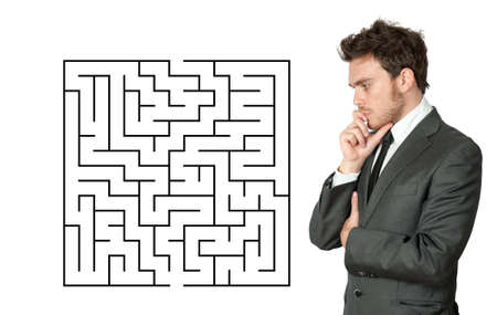 Businessman seek the solution of a complex maze