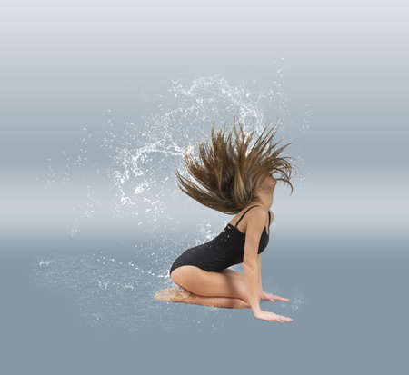 Dancer with water drop in the hairの写真素材