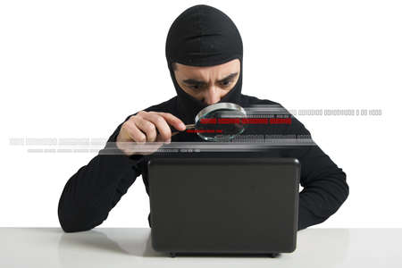 Concept of hacker at work with lensの写真素材