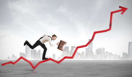 Concept of a businessman that rise statisticsの写真素材