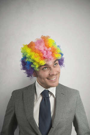 Concept of creative businessman with colorful hairの写真素材