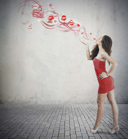 Young fashion girl with red kissの写真素材