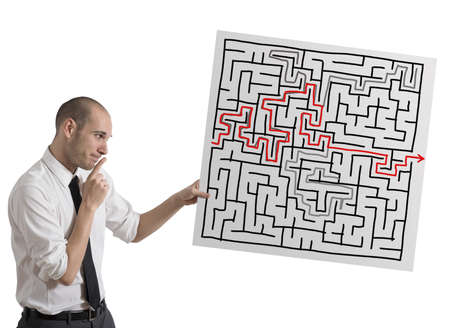 Businessman finding solution for the mazeの写真素材
