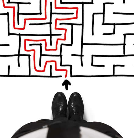 Concept of difficulty with businessman and mazeの写真素材