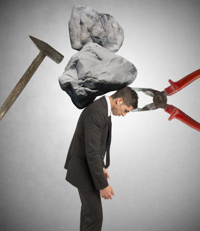 Stress concept of a businessman at workの写真素材