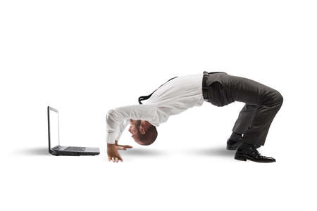 Concept of acrobatic business with man and laptop
