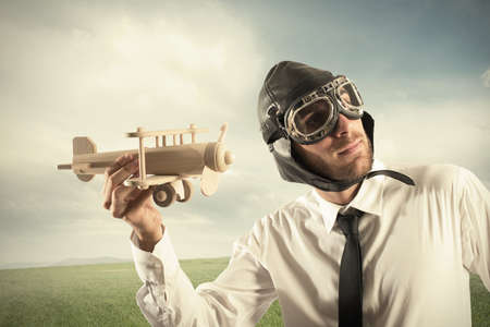 Concept of business in action with businessman with a airplaneの写真素材