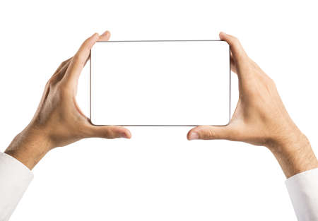 Man holding a tablet with blank screenの写真素材