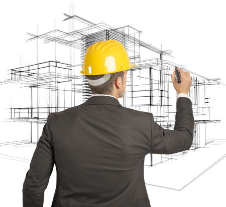 Architect drawing a futuristic sketch on a virual screenの写真素材