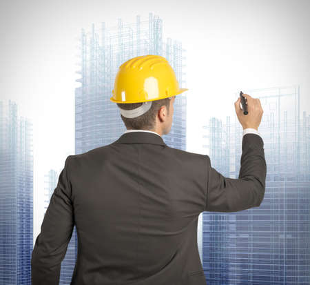 Architect drawing a futuristic sketch on a virual screenの写真素材