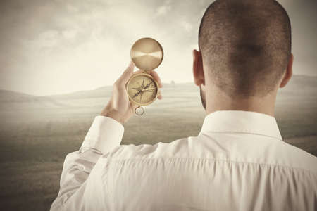 Concept of business direction with businessman and compassの写真素材