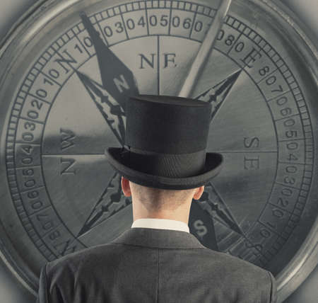 Concept of business direction with businessman and compassの写真素材