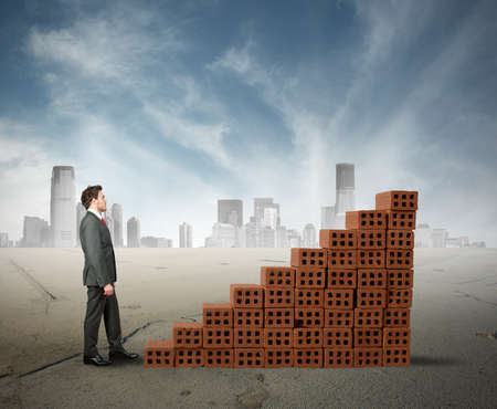 Concept of building a business with statistic made of brickの写真素材
