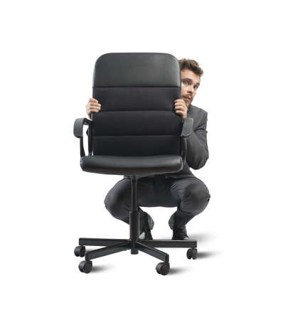Concept of businessman hiding from the crisisの写真素材