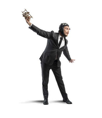Concept of a businessman who dreams to flyingの写真素材