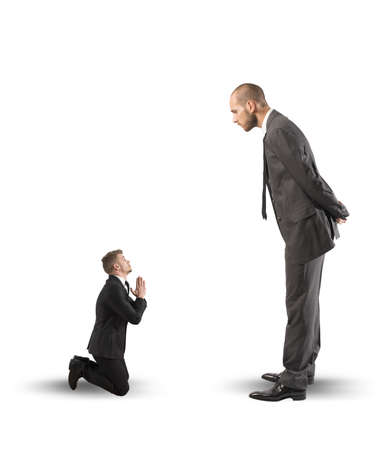 Concept of Businessman praying the big bossの写真素材