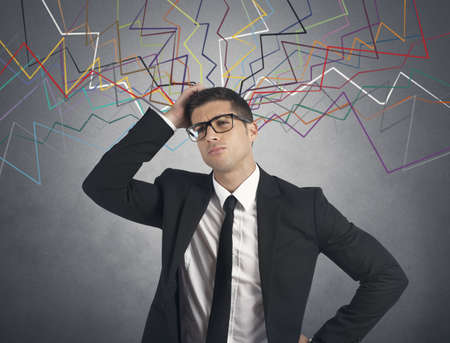 Concept of stressed businessman with multiple linesの写真素材