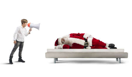 A child wake up asleep Santa Clausの写真素材