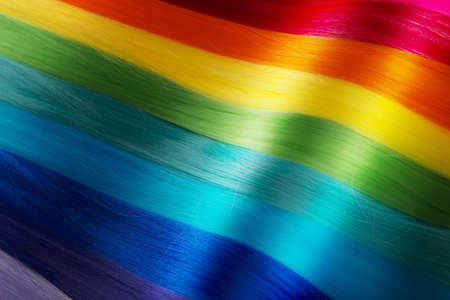 Shiny fashion hair background with rainbow colorの写真素材