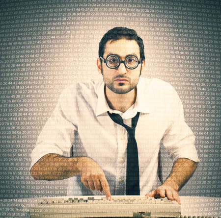 Nerd programmer with code of a softwareの写真素材