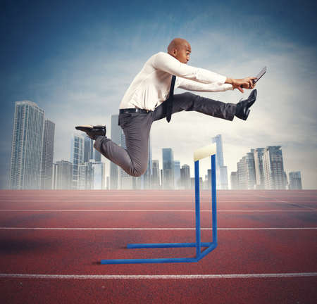 Concept of career difficulty with jumping businessmanの写真素材