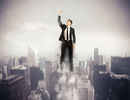 Concept of determination and success with flying  hero businessmanの写真素材