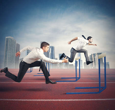 Concept of business competition with jumping businessmanの写真素材