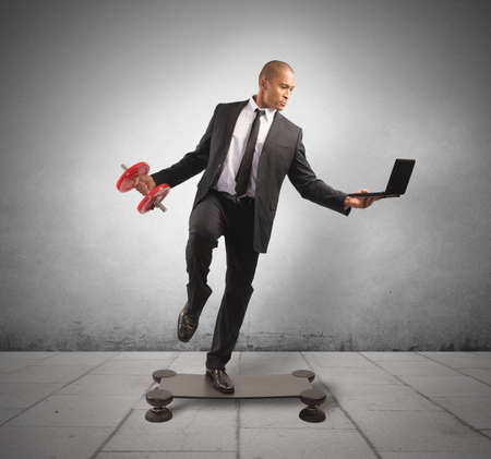Concept of hard and acrobatic business of a successful manの写真素材