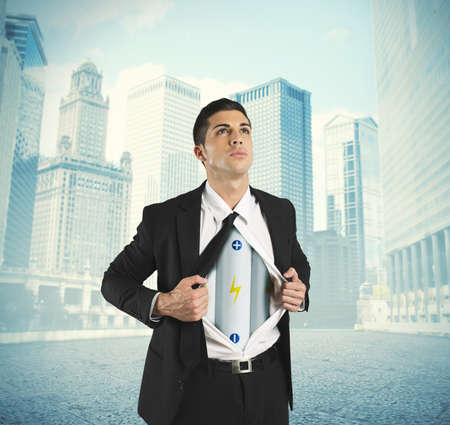 Concept of power in business with battery under the shirtの写真素材