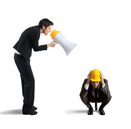 Concept of reproach with businessman shouting through a megaphoneの写真素材