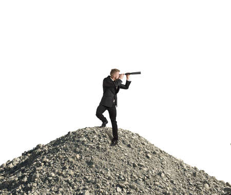 Concept of business vision with businessman with telescopeの写真素材