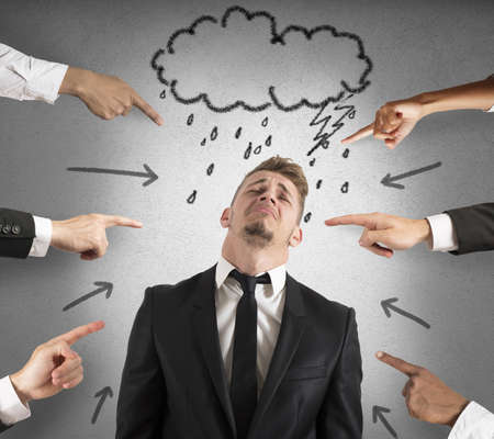 Concept of accused businessman with fingers pointingの写真素材