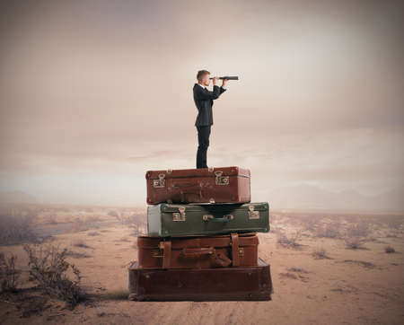 Concept of travel with businessman with binocular