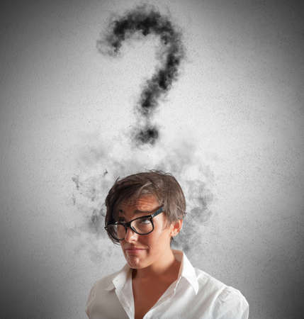 Concept of stressed businessman with question markの写真素材