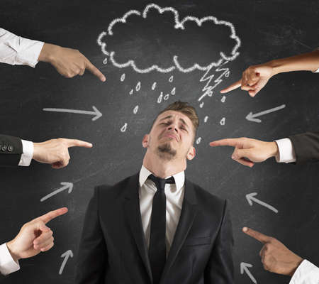 Concept of accused businessman with fingers pointingの写真素材