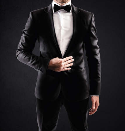 Sexy elegant businessman with bow tie and white shirt Sexy elegant businessman with bow tie and white shirt