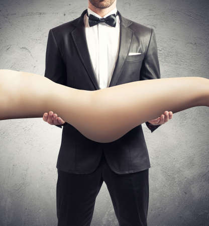 Man adores the body of a sexy girlの写真素材