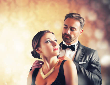 A man gives a necklace to his wife