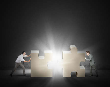 Teamwork and partnership concept of two businessmanの写真素材