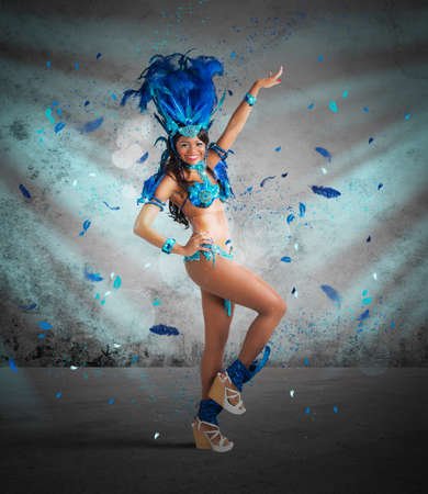 Happy samba dancer with brilliant blue costume