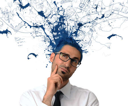 Creative businessman with blue color exit from the headの写真素材