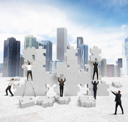 Business people builds  together a new companyの写真素材