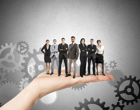 Concept of Teamwork and integration with businessperson over the handの写真素材