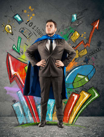 Businessman as hero of statistics and diagramsの写真素材