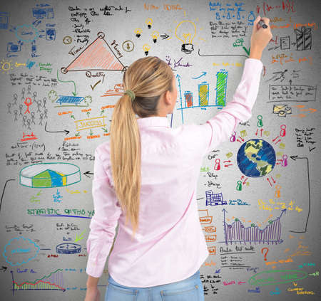 A blonde women drawing her projectの写真素材