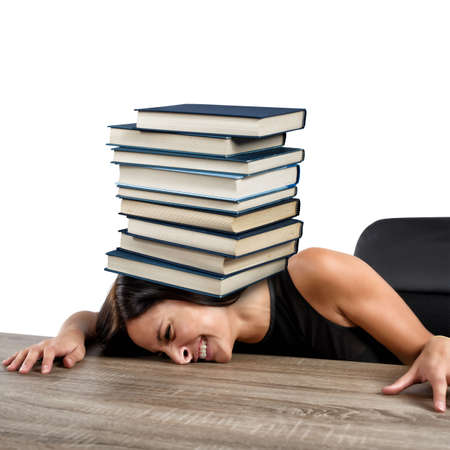 Women crushed on the table by booksの写真素材